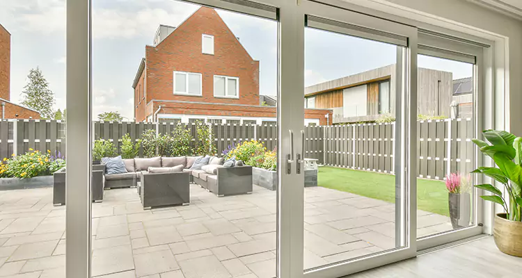 Impact Glass Sliding Patio Doors Repair in Country Club, FL